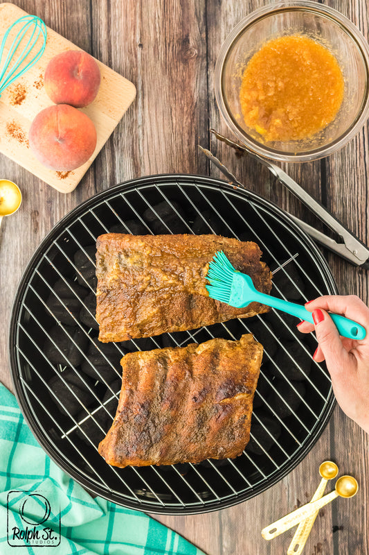 Exclusive Grilled Chipotle Pork Ribs with Peach Bourbon Glaze